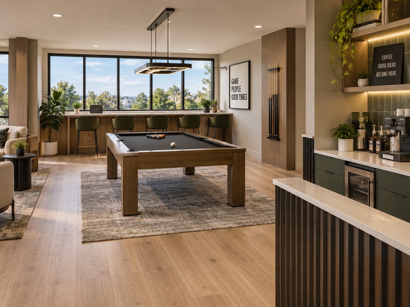 Shared amenity space with a pool table and coffee bar